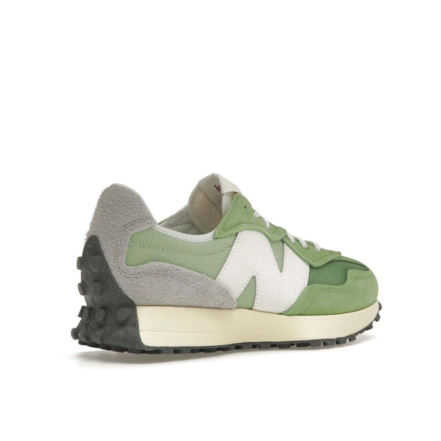 New Balance 327 sneakers, back view, in chive green and avocado with white details.