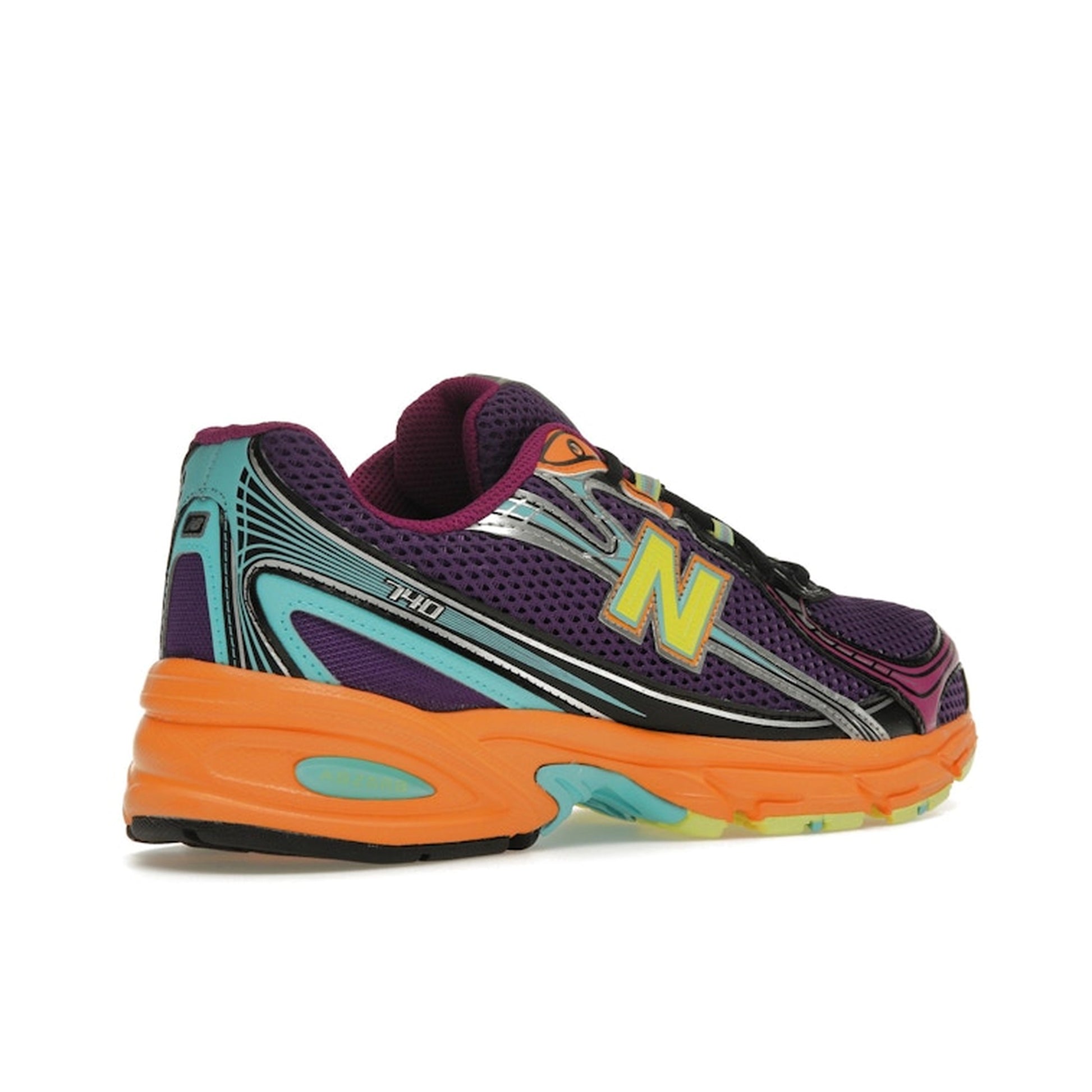 New Balance 740v2 Concord Grape Sun Glow, back view, in rich purple with vibrant orange details.