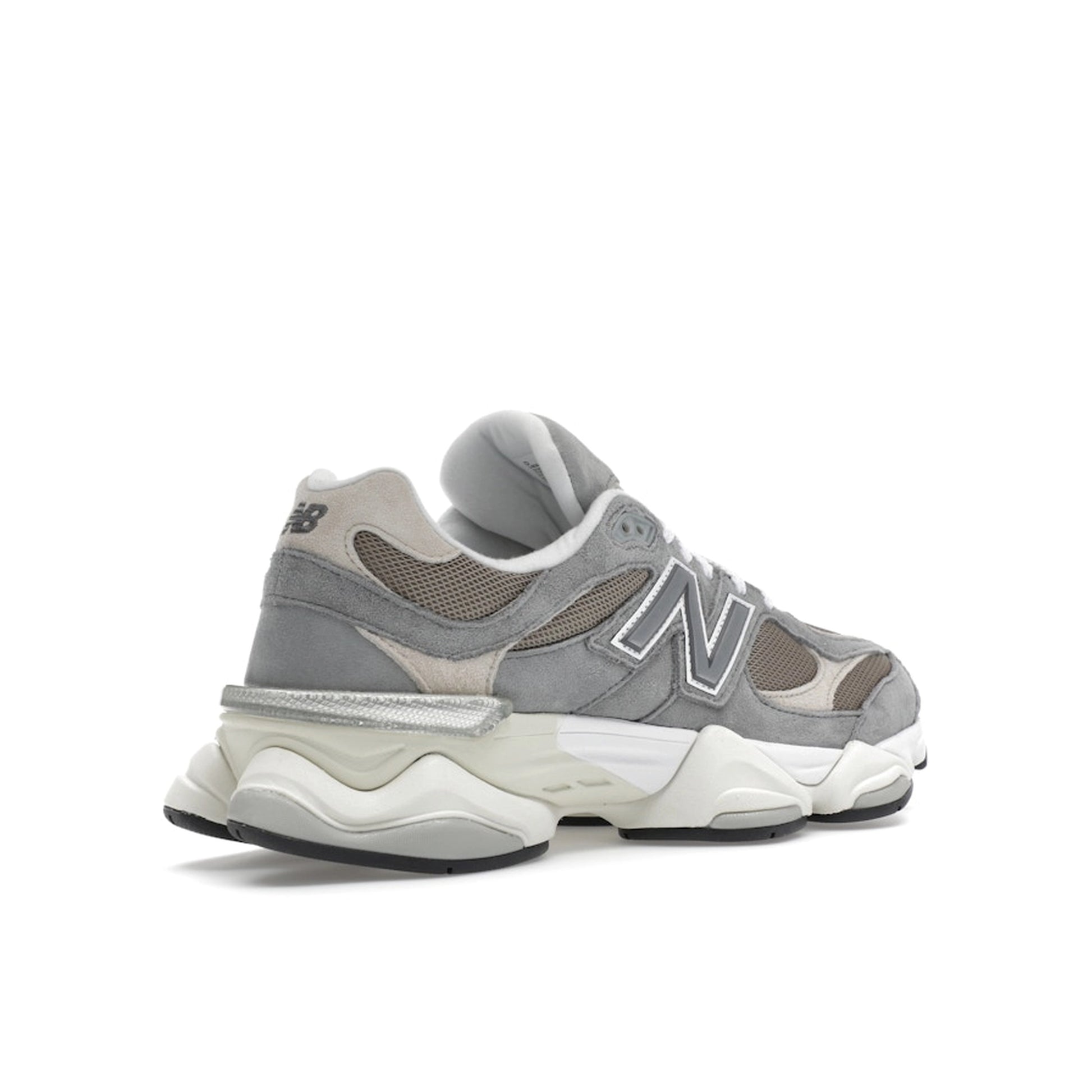 New Balance 9060 Slate Grey Arid Stone, back view, with grey upper and neutral details.