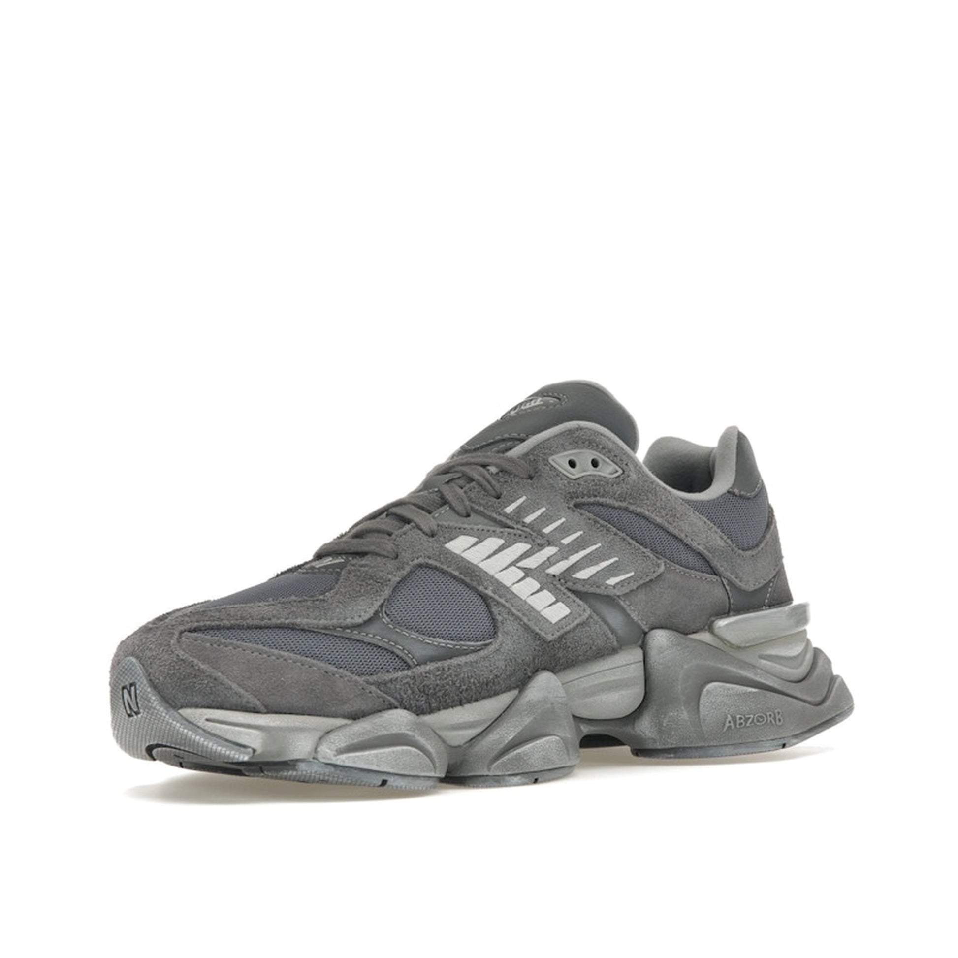 New Balance 9060 sneakers, front view, model U9060SG in magnet with black and grey details.