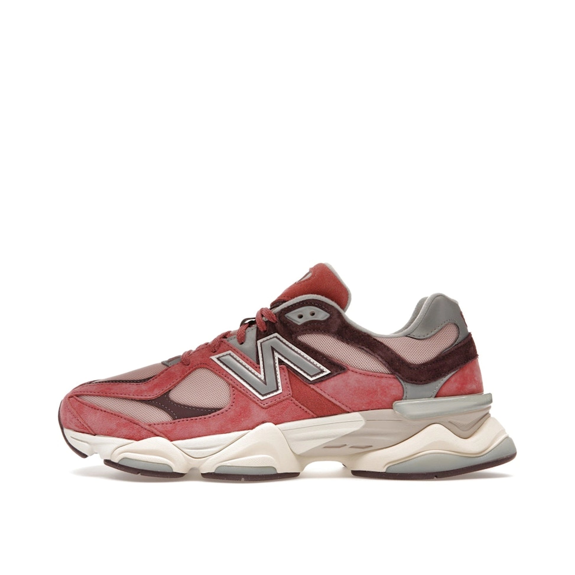 New Balance 9060 sneakers, side view, model U9060TRU in cherry blossom with beige and white details.