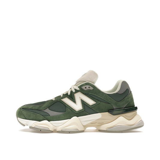 New Balance 9060 Nori, side view, in olive green with a mix of suede and mesh materials.